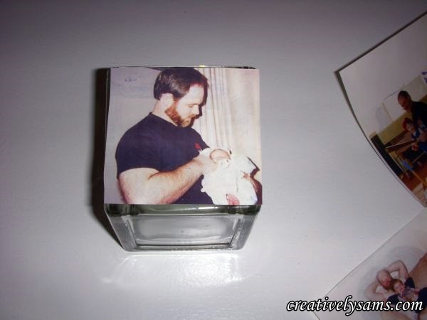 father s day photo centerpiece tutorial, crafts, seasonal holiday decor, Trim photos to fit the square glass candle holder Peel off backing carefully add picture to candle holder Repeat for all 4 sides smooth out any air bubbles as you go